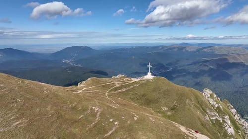 View of the Cross of Heroes on Mount Caraiman in the Bucegi Mountains, Romania