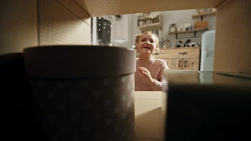 Happy Child Opening Christmas Gift Box