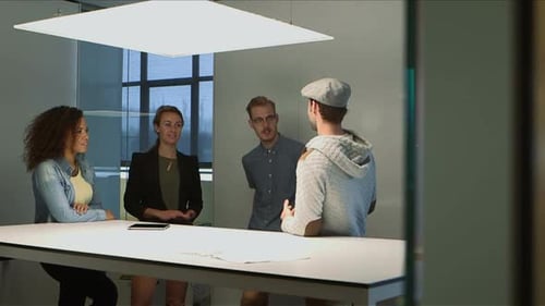 Business Colleagues Collaborate at Modern Office Meeting