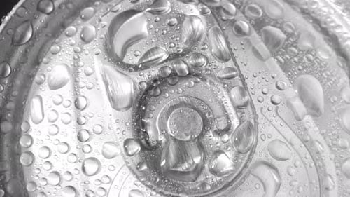 A close-up view of a beverage can's top.