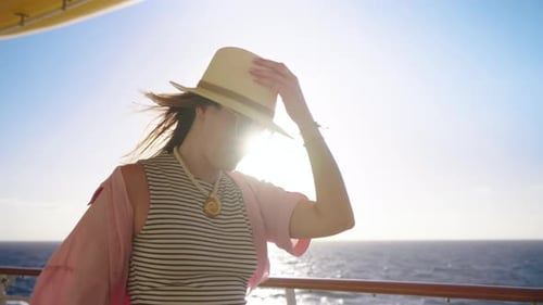 Stylishly Dressed Woman Delightfully Enjoying a Scenic Cruise in the USA