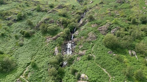 Aerial View of Mountain Stream and Waterfall