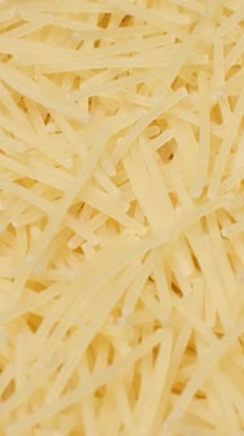 Close Up of Raw Macaroni Cooking Pasta Macaroni Background Vertical Video