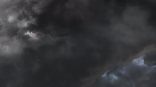 4k view of The dark clouds on dramatic sky.