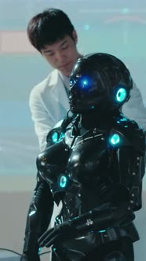 Humanoid Robot Being Programmed in a Futuristic Lab