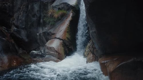 Powerful Mountain Waterfall Slow Motion Zoom in Shot of Flowing River Water