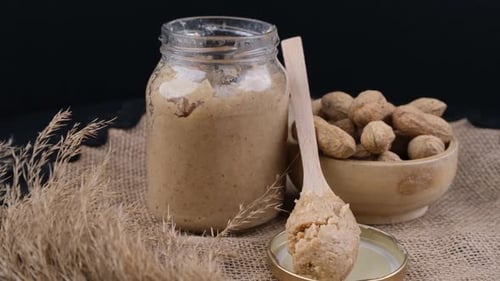 Peanut Butter, Peanuts and Wooden Spoon Still Life