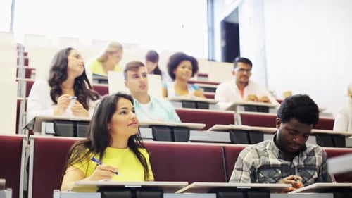International students discussing knowledge in a university lecture hall