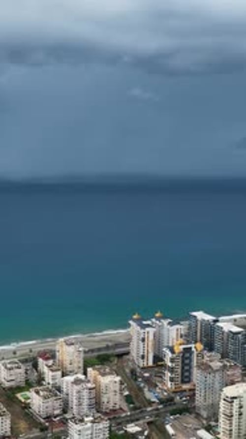 Vertical Video Aerial Escape Moody Mediterranean Coastline with Cinematic Sea Textures