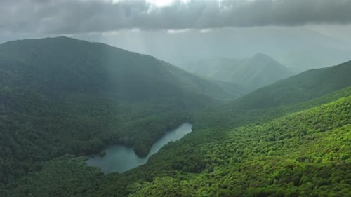 Clouds Over Summer Green Mountains