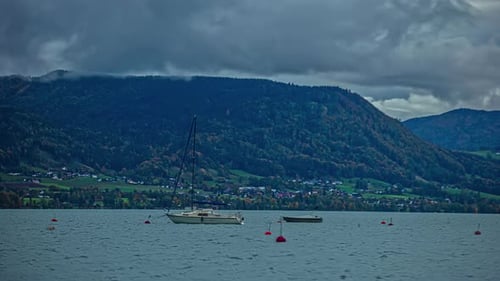 Time Lapse boats buoyant Landscape sea near coast under stormy sky, black clouds