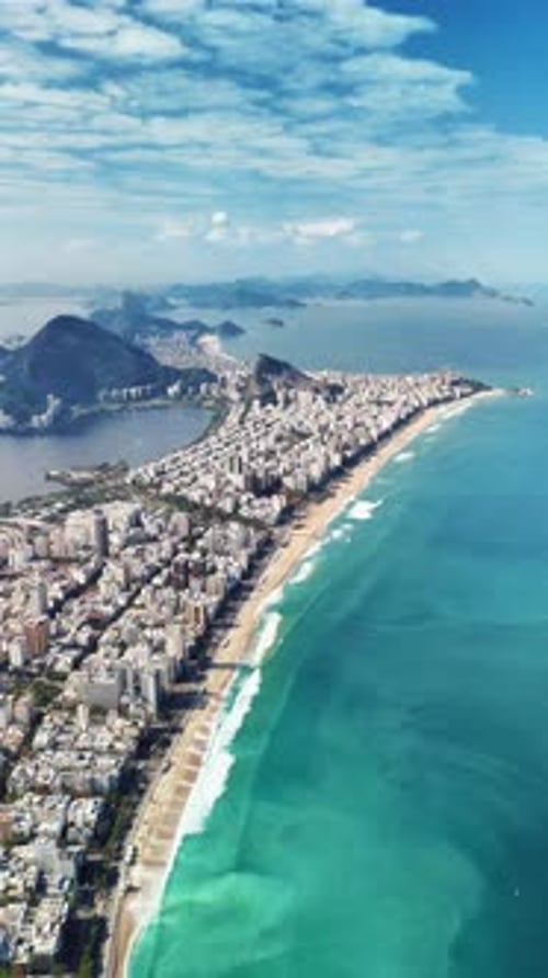 Vertical: Drone Descending Over Rio de Janeiro Beaches, Ocean, and Skyline