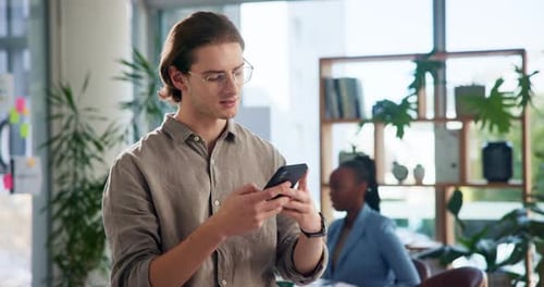 Business, typing and man in office, smartphone and connection with research for article