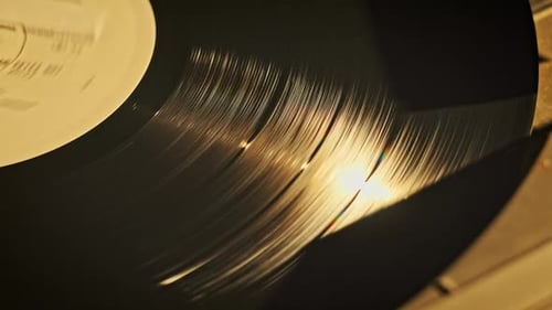 Vintage Vinyl Record Spinning CloseUp on the Retro Turntable