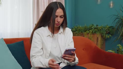 Woman Reacts Badly to News on Phone, Crying