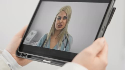 Telehealth Consultation with Doctor on Tablet Screen