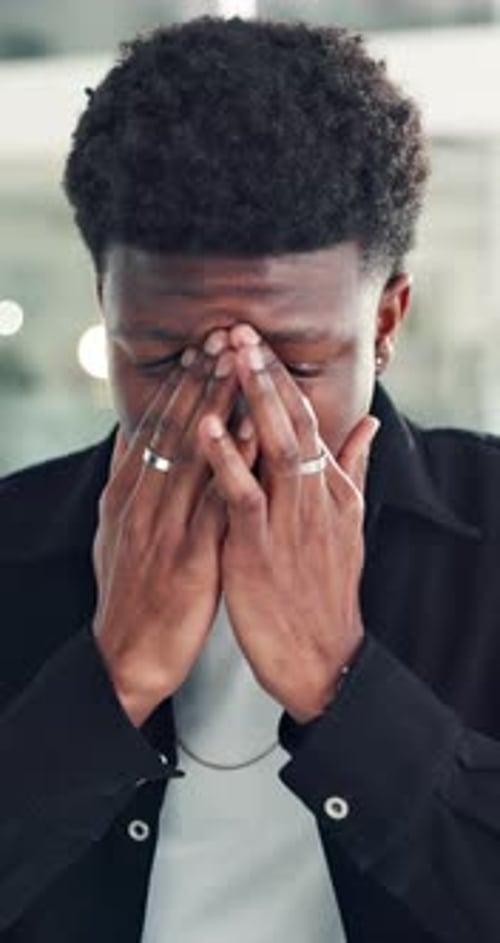 Business, stress or black man in office with headache, overwhelmed or burnout for proposal deadline