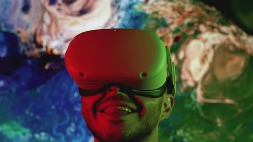 Man Experiencing Virtual Reality with Modern VR Headset