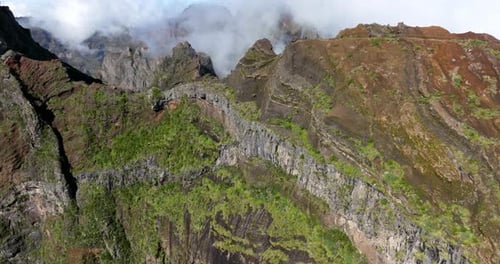 Towering Steep Mountain Ridges Of Pico do Arieiro In Madeira Island, Portugal. Aerial Drone Shot