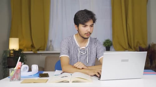 Frustrated male student.