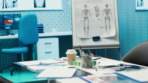 Clean Medical Office with Skeleton Chart and Desk