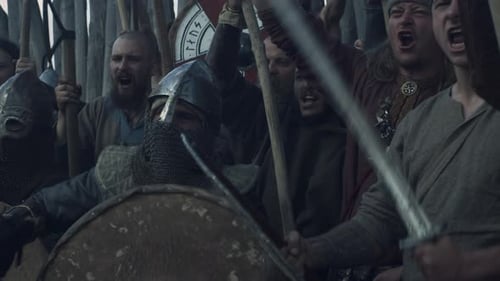 Group of Warriors Shouting with Weapons and Shields