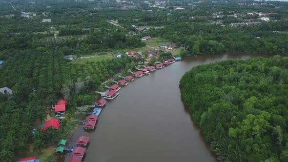 Drone view of meandering river and villas in Rompin Pahang, Malaysia ...