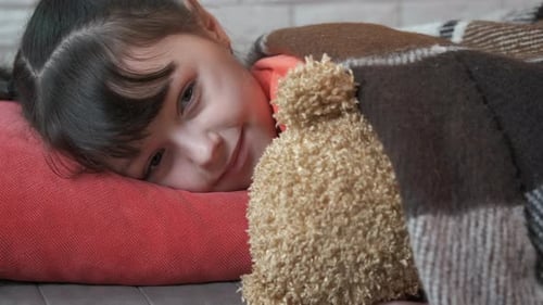 Lay in Bedroom with Toy