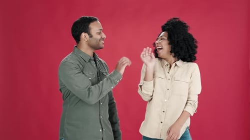 Multiracial Couple of Friends Performs Highfive Happily