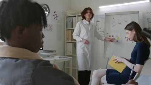 Science Class in Session with Students Learning Chemistry