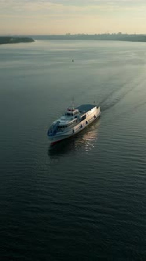 Passenger Ferry Navigating River at Sunrise Clip