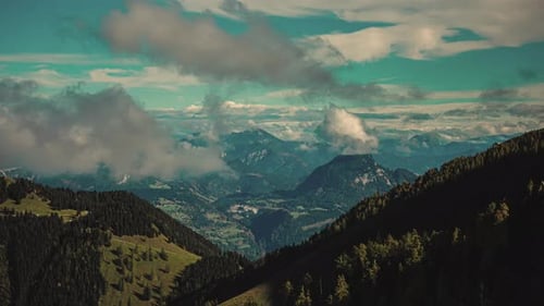 Breathtaking aerial time-lapse of expansive green mountainous landscape. Aerial.