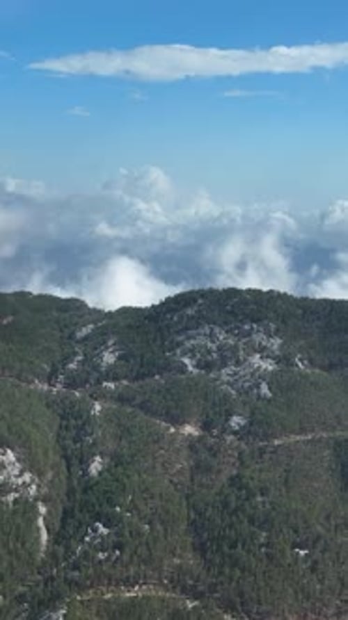 Vertical Video Cloudy Landscape in the Mountains Aerial View