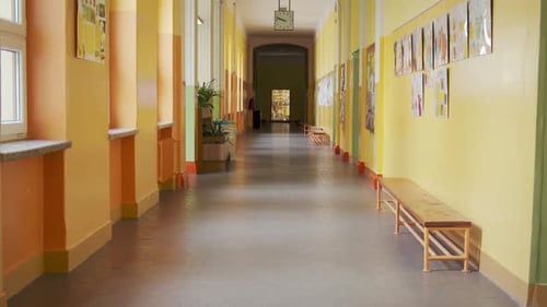 Empty hallway of elementary school. Camera tilt up