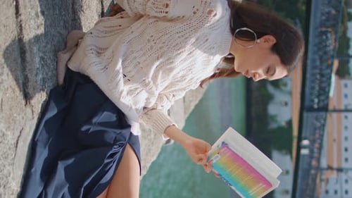 Young Woman Reading Book Sitting River Embankment Girl Relaxing Vertically