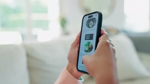 Hands Scrolling a Food App on Mobile Phone