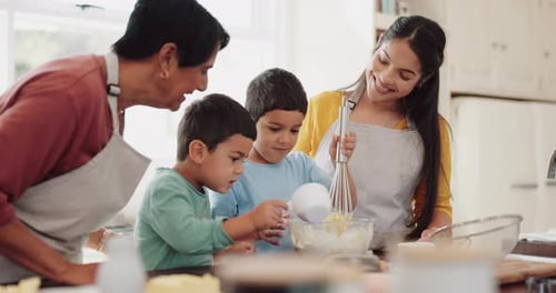 Family Enjoys Baking Together in Kitchen at Home