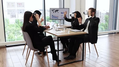 Business Team Using Virtual Reality in Modern Office Meeting