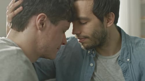 Cute Male Queer Couple Put Their Heads Together and Close Their Eyes. Sweet Gentle Loving Gay Relat