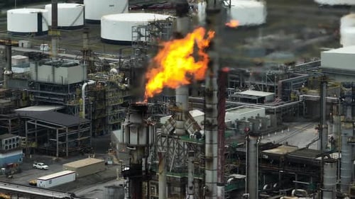 Aerial view of oil refinery and exhaust flame_1