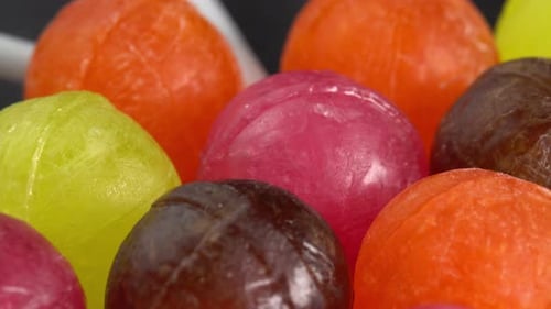 Colorful Round Lollipops Piled Close Up