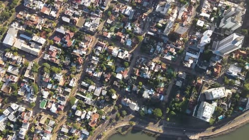 Aerial view of the coastal city of Posadas Misiones Argentina, drone shot of densely populated coast