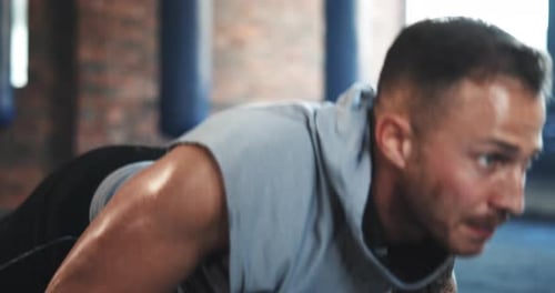 Fitness, push up and strong with man in gym for workout, challenge and body health