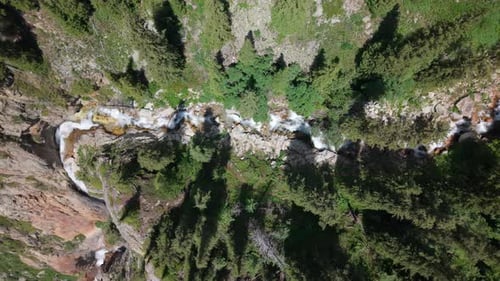 Overhead View of Clear Water Flowing Through Rocky Gorge
