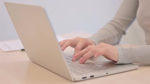 Close up of Woman Typing on Laptop