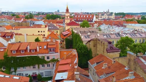 Lower altitude aerial view from the Vilnius cityscape towards the St. Nicholas Church, Lithuania.
