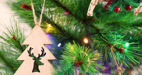 Festive Christmas Tree Decorated with Wooden Ornament