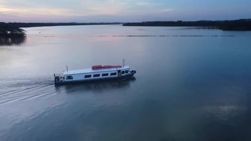 river boat sunset beautiful colorful mirrored drone