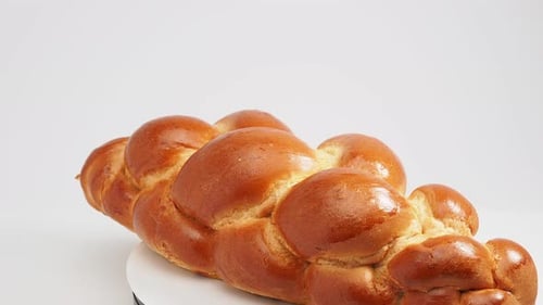 White baton. Sweet white bread. Sweet bread. Close-up.