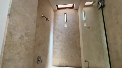 Modern Bathroom Interior with Shower and Skylight